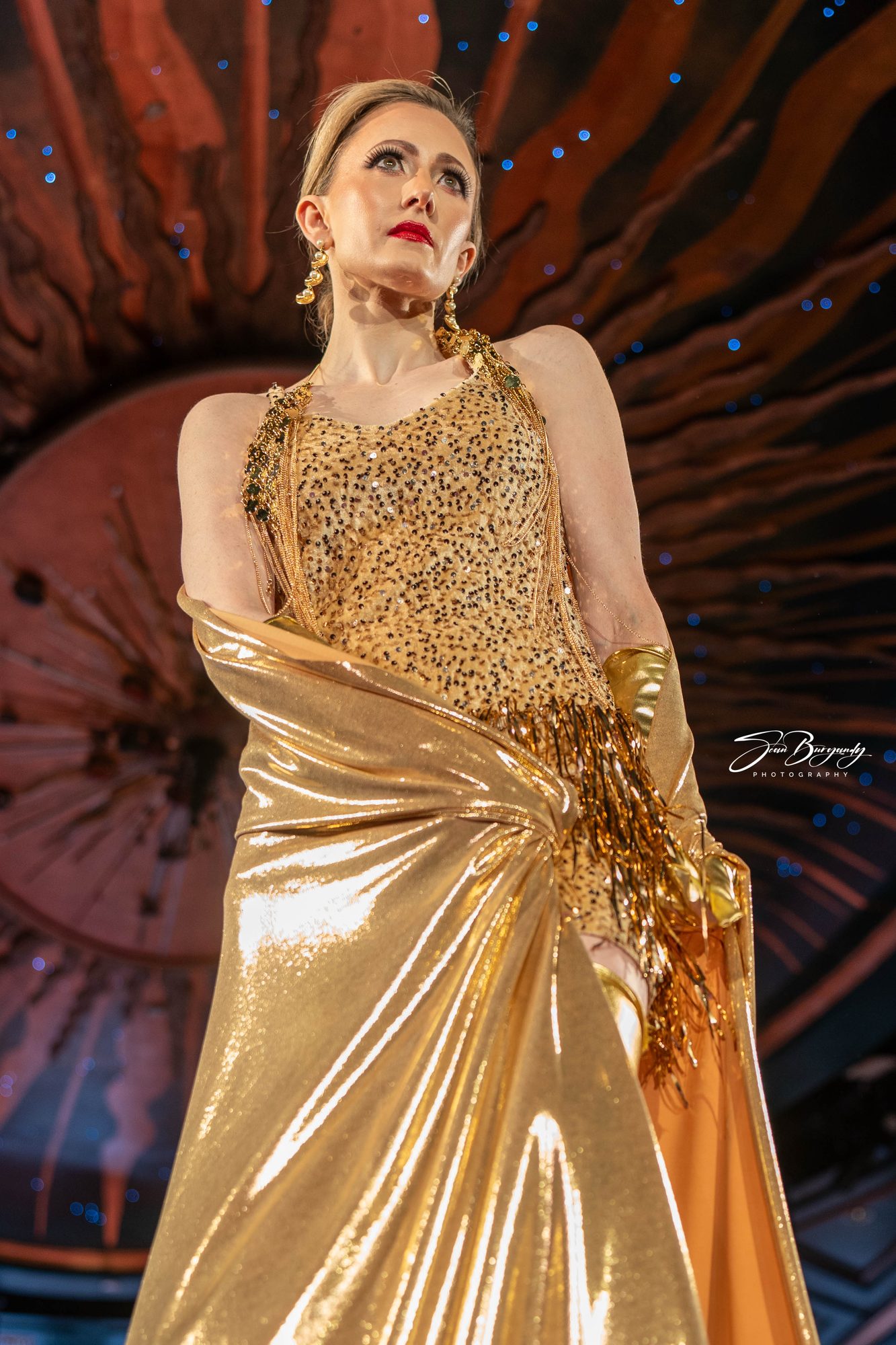 Gold sequin gown with chain drape, NYFW